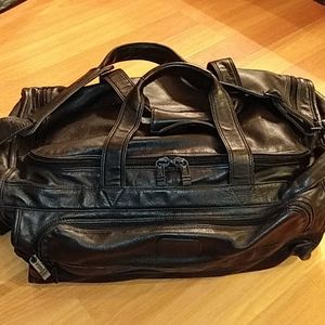 tumi leather duffle